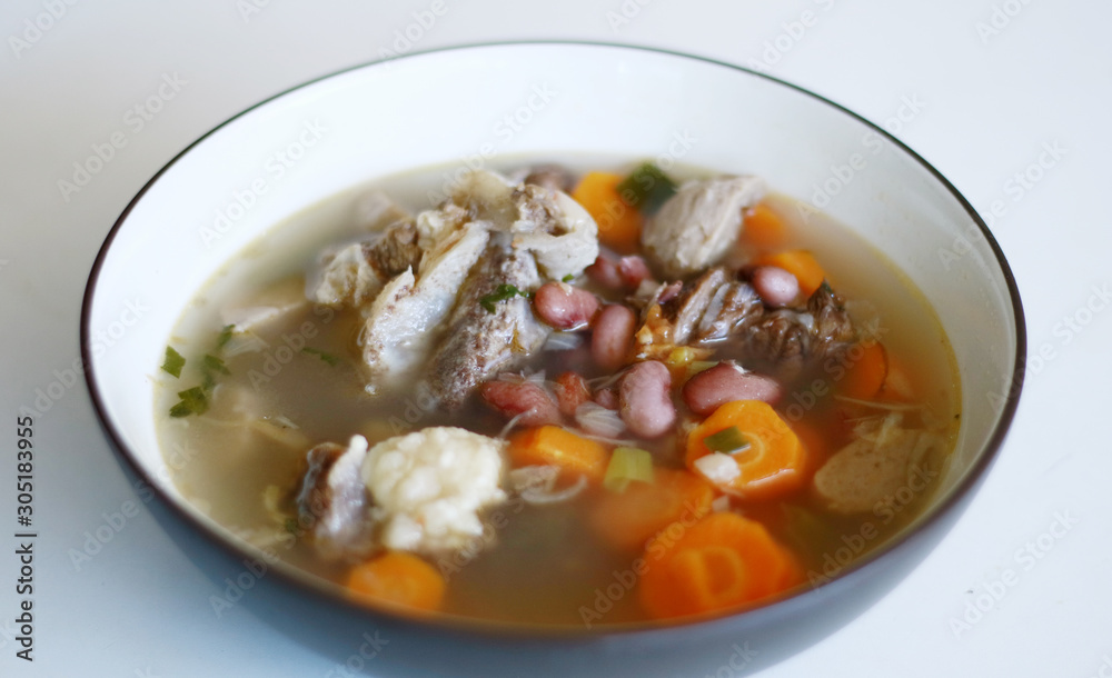 Red kidney bean soup on white background. Indonesian food. Red kidney bean soup on white background. Indonesian food.