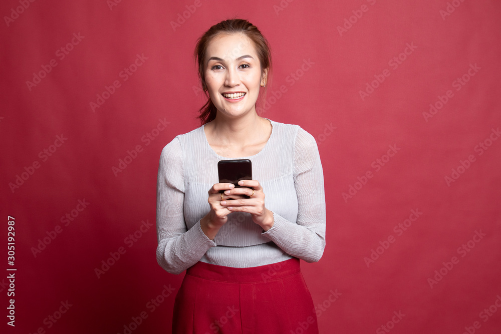 Young Asian woman with mobile phone. Young Asian woman with mobile phone.