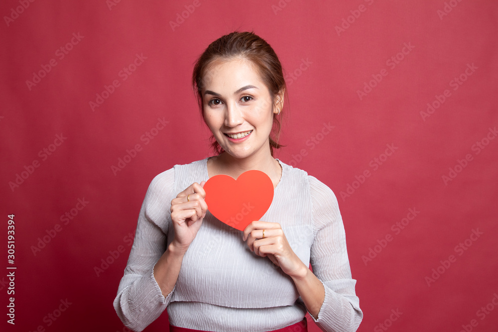 Asian woman with red heart. Asian woman with red heart.