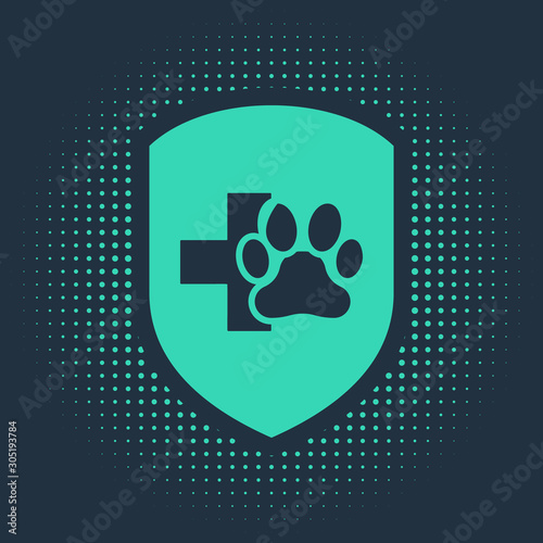 Green Animal health insurance icon isolated on blue background. Pet protection icon. Dog or cat paw print. Abstract circle random dots. Vector Illustration