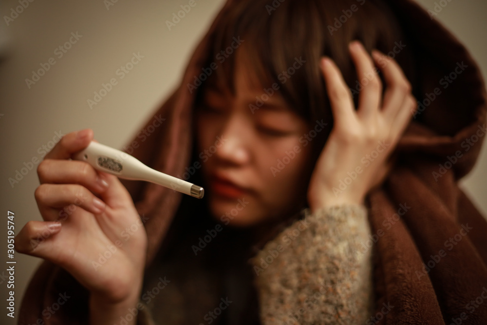 体調不良の女性 体調不良の女性