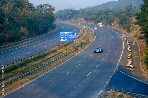 The Mumbai Pune Expressway early morning near Pune India. The Expressway is officially called the Yashvantrao Chavan Expressway. photo