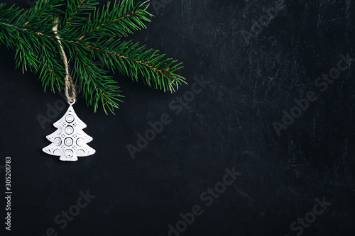 Christmas background with fir branch and christmas tree.