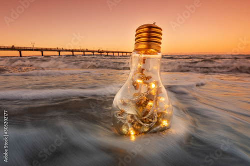 Fototapeta Naklejka Na Ścianę i Meble -  Flaschenpost an der Seebrücke Rügen