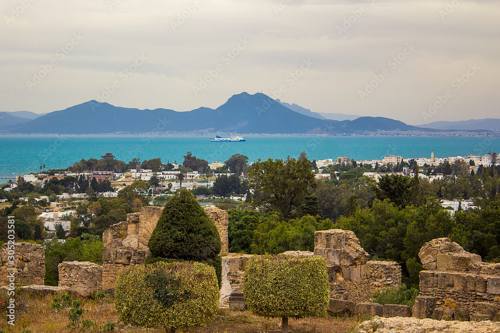 View on the Boukornine mountain from the Byrsa hill, Carthage, Tunisia, beautiful green trees and blue Gulf of Tunis