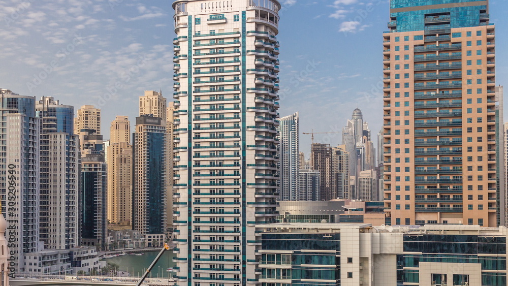 Dubai Marina skyscrapers, port with luxury yachts and Marina promenade aerial timelapse, Dubai, United Arab Emirates