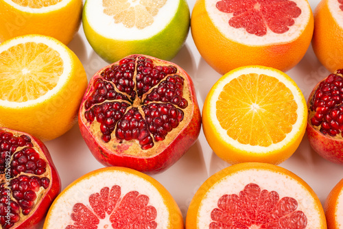 Fototapeta Naklejka Na Ścianę i Meble -  Grapefruit, orange, pomegranate, citrus sweetie on white background.