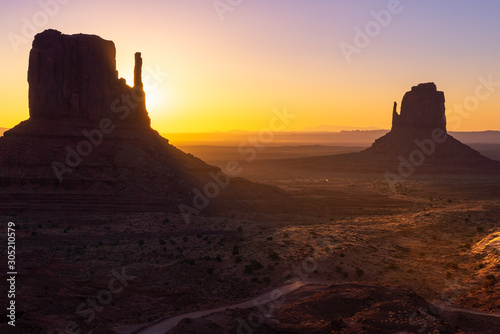 East and West Mitten Buttes at sunrise  Monument Valley Navajo Tribal Park on the Arizona-Utah border  USA 
