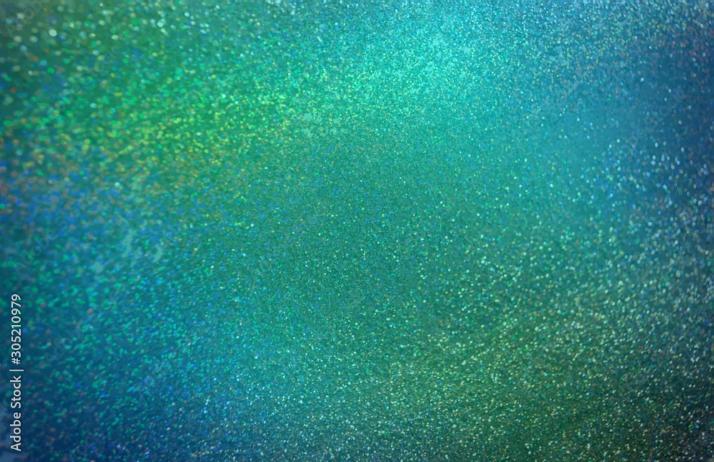 Green blue glitz abstract pattern. Glitter blurred texture. Magical spearkles background. 