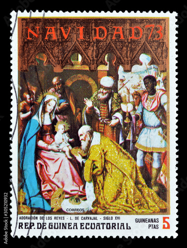 Cancelled postage stamp printed by Equatorial Guinea, that shows Painting by Carvajal, circa 1973. photo