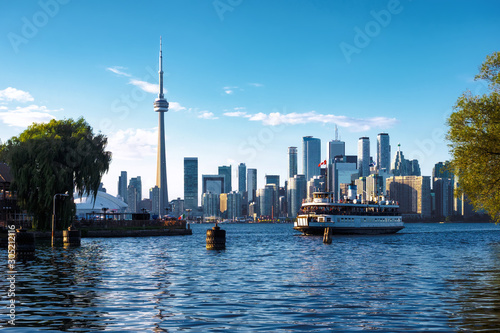 Toronto, Ontario, Canada, View of Skyline and Ferry Boat Arriving at Centre Island photo