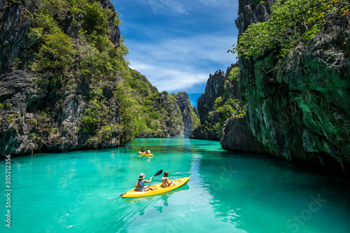 Palawan, Philippines, Tourists Kayaking and Exploring the Natural Sights Around El Nido