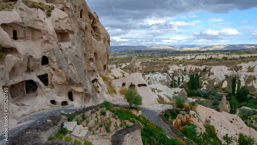 Fototapeta Naklejka Na Ścianę i Meble -  Unreal world of Cappadocia. Colorful Pigeon valley. Uchisar village located, Nevsehir Province in the Cappadocia region of Turkey, Asia. Traveling concept background