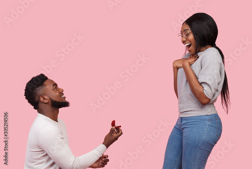 Man in love making proposal to his girlfriend photo