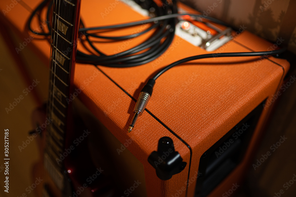 Guitar amplifier with guitar plug and cable Guitar amplifier with guitar plug and cable