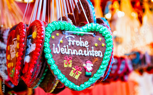 Canvas Print Heart shape Gingerbread cookies food on Christmas market in Europe in winter