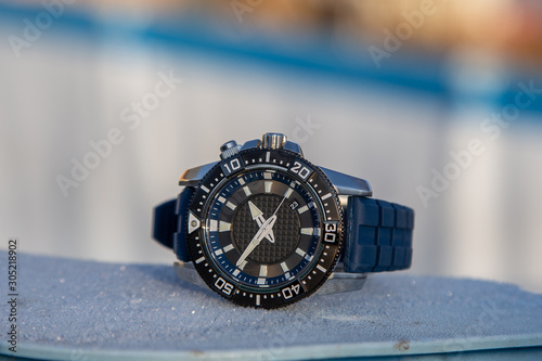 Diver watch with blue strap