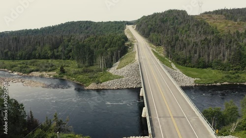 Wallpaper Mural 4K Salmon river going down view of bridge - Drone flying - road - top down Torontodigital.ca
