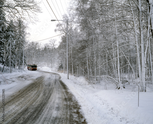 bus in road in winter