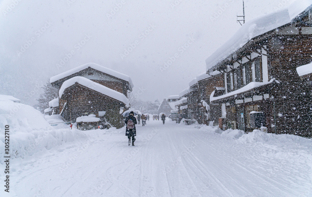 Fototapeta premium The traditionally thatched houses in Shirakawa-go where is the mountain village among near Gifu, Ishikawa, and Toyama prefecture in winter, Japan