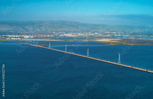 Photography Aerial view of San Mateo Bridge crossing the San Francisco Bay