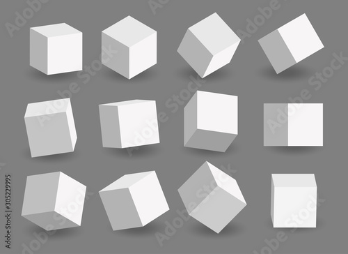 Set of white vector 3d cubes. Cube icons in a perspective. Geometric blocks with shadow. Vector illustration isolated on grey background.	