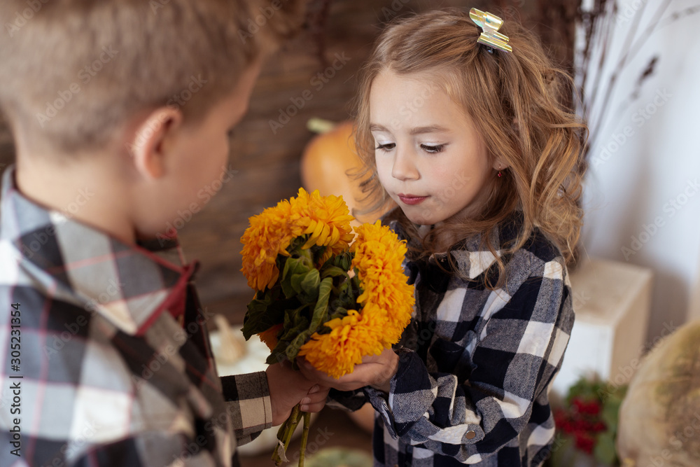 boy present girl bouquet of yellow flowers. love concept boy present girl bouquet of yellow flowers. love concept