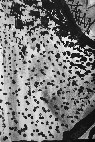 Abstract black and white paint background with dots