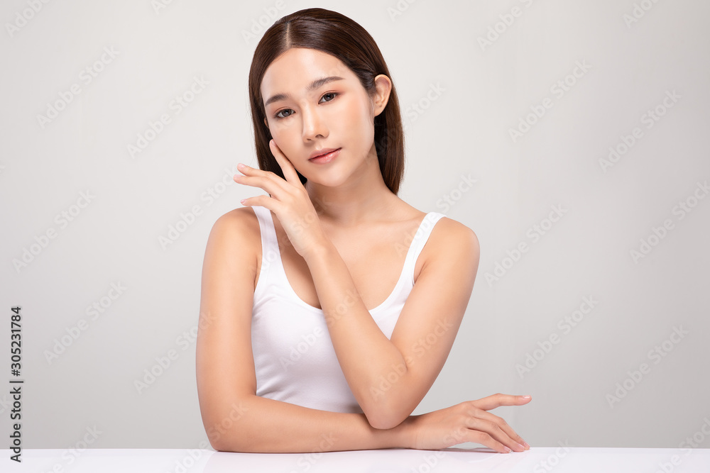 Beautiful Asian young woman touching soft cheek smile with clean and fresh skin Happiness and cheerful with positive emotional,isolated on white background,Beauty and Cosmetics Concept Beautiful Asian young woman touching soft cheek smile with clean and fresh skin Happiness and cheerful with positive emotional,isolated on white background,Beauty and Cosmetics Concept