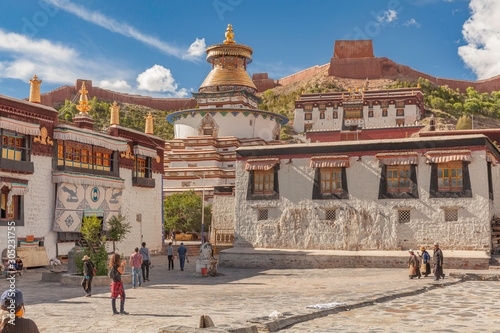 Magnificent Kumbum Stupa in Gyantse with fortress in background, Tibet