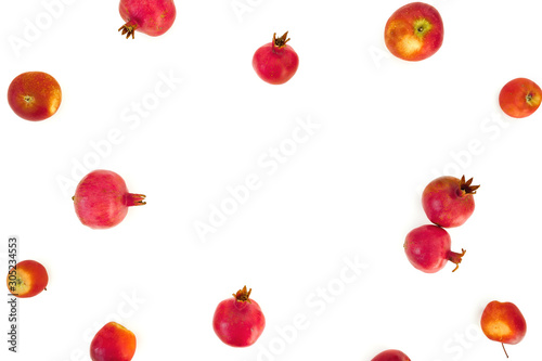 Pomegranate frame isolated on white background. Food background. Flat lay