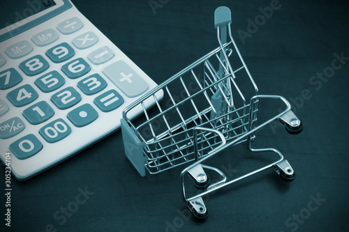 Smart shopping concept, shopping cart and calculator