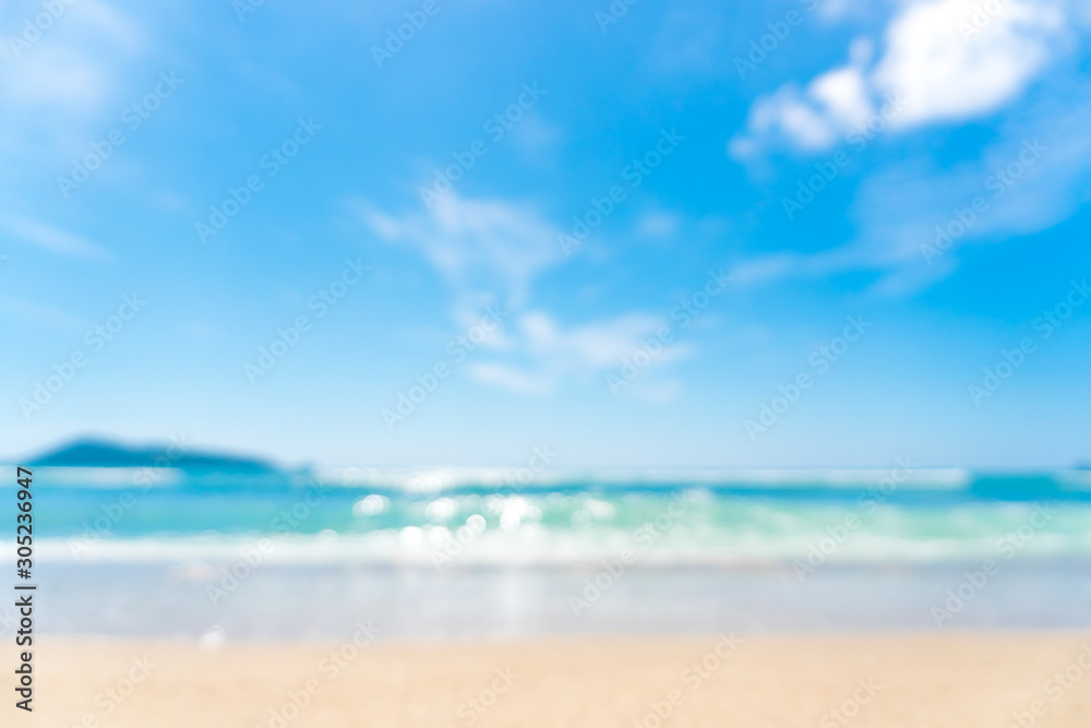 Blur tropical beach with bokeh sun light wave abstract background. Blur tropical beach with bokeh sun light wave abstract background.