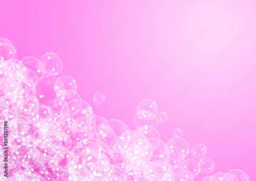 Soap suds on pink background with copy space