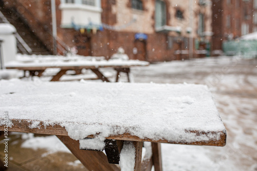 Wooden Benches In Snow