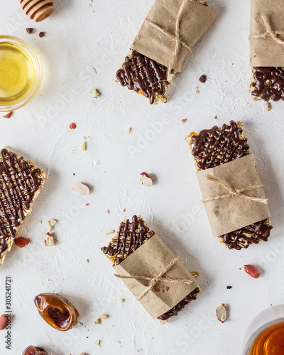 Useful energy bars of oatmeal and dried fruits. photo