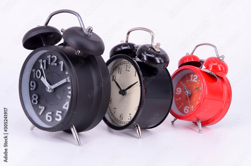 Alarm clock on white background. Selective focus. Alarm clock on white background. Selective focus.