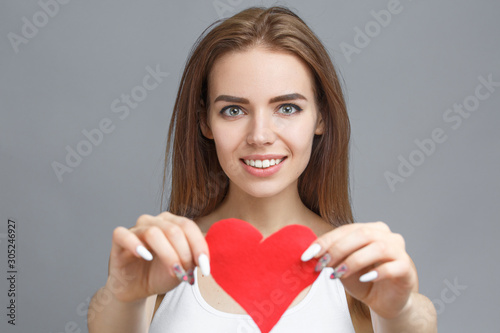 teen girl hold red heart. valentine day