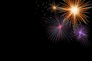 abstract show group of exploding fireworks bright light vibrant colorful and falling fire glitter confetti on black background for happy new year,diwali,labor's day ,independence's day concept	