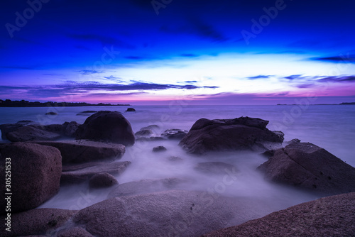 The pink granit coast at dusk © Yggdrasill