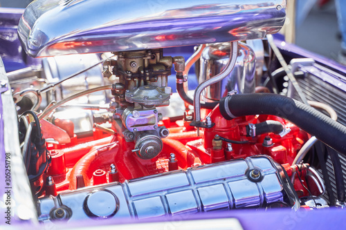 vintage restored engine from an old car with a carburetor