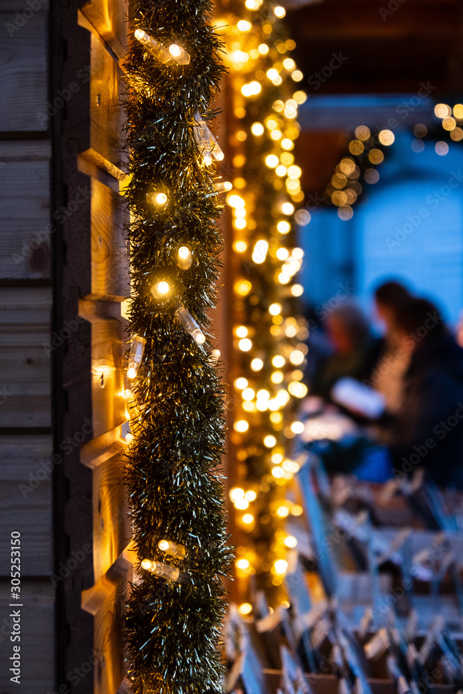 Lichterkette auf einem Weihnachtsmarkt Stock Photo | Adobe Stock