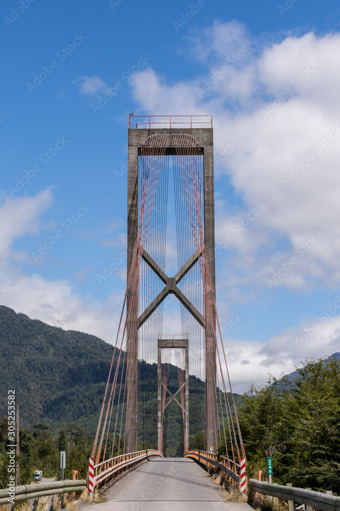 Suspension bridge over Yelcho Lake in Puerto Cardenas, Los Lagos region, Patagonia, Chile