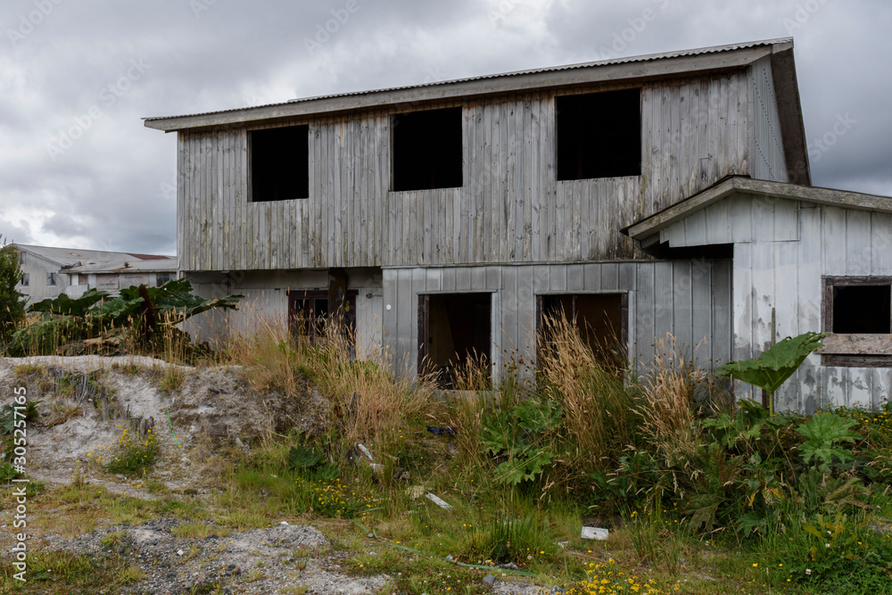 Destroyed and abandoned buildings after Chaitén volcano eruption in 2008 in Chaitén city, Los Lagos Region, Patagonia, Chile Destroyed and abandoned buildings after Chaitén volcano eruption in 2008 in Chaitén city, Los Lagos Region, Patagonia, Chile