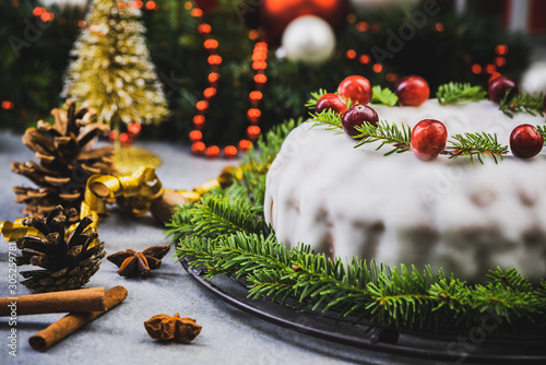 Christmas Traditional Cake on Festive Decorated Table