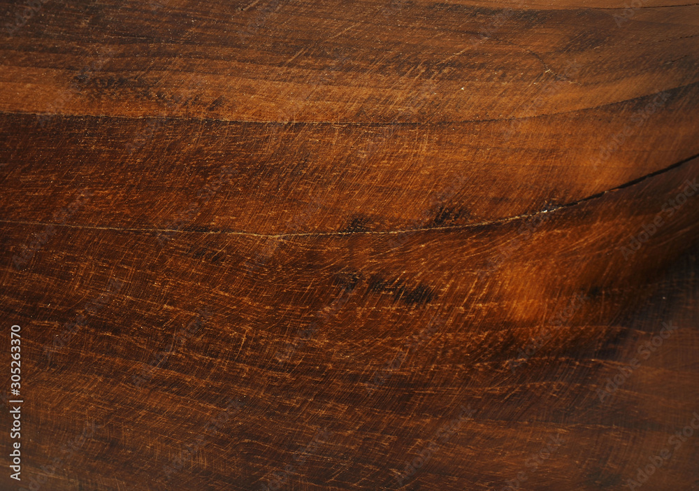 Natural wood grain blackground in warm tones.