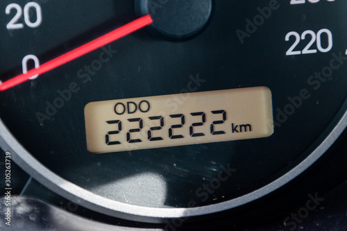 Car odometer reaches a two hundred and twenty-two thousand two hundred and twenty-two kilometres.. photo