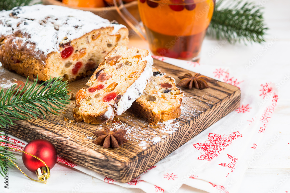 Stollen traditional Christmas ftuitcake with dried fruit and nut Stollen traditional Christmas ftuitcake with dried fruit and nut