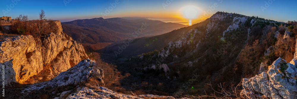 Rocky mountain range at sunrise, panorama