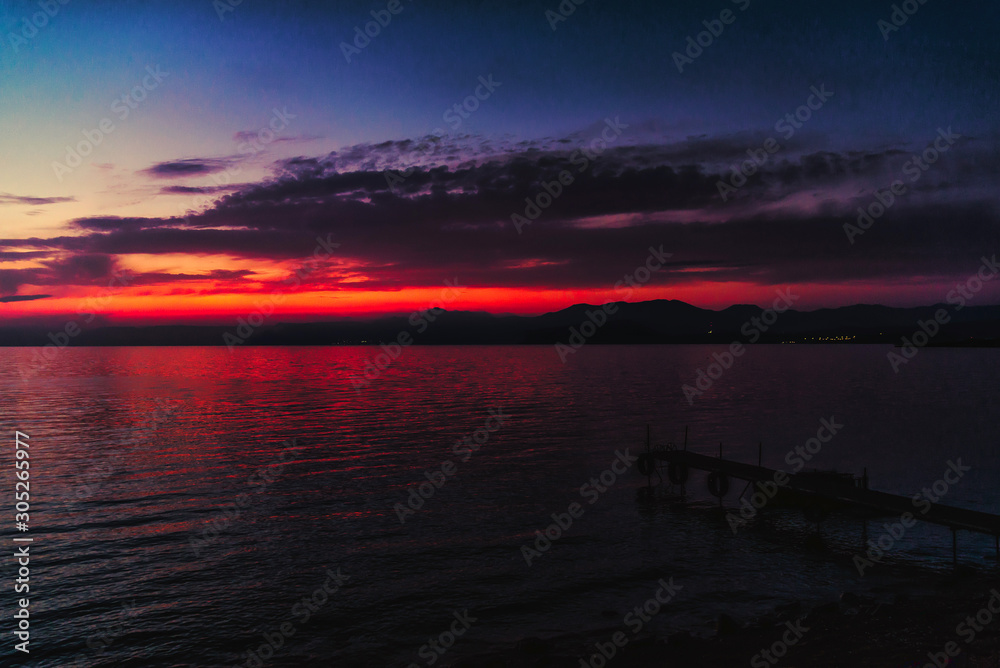 Deep blue red sunset over the sea